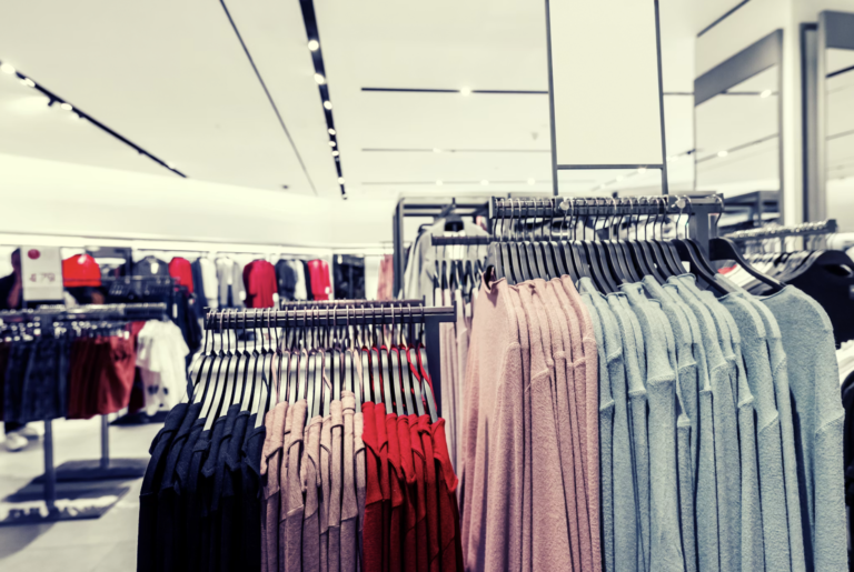 Racks full of clothes in a shop