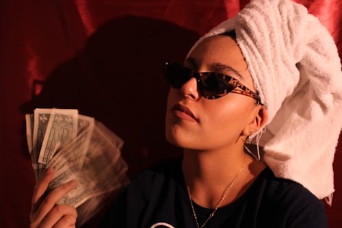 Woman holding banknotes